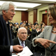 Nancy Pelosi talks to Richard Gere at a memorial event for Kasur Gyari, former special envoy of the Dalai Lama to the US, March 12, 2019.